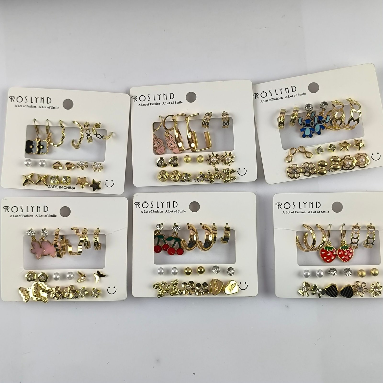 Set de Aretes 9 Pares Dorados con Diseños Variados | Argollas, Figuras y Detalles Elegantes - Image 8