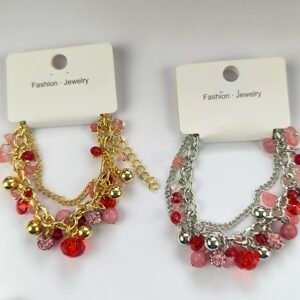 Pulseras tipo charm con cristones y perlas, ajustables dorado y plateado por docena.